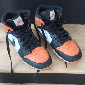 Nike High-Top Sneakers in Black, White, and Orange